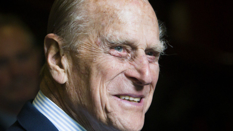 Elderly Prince Philip suit smiling