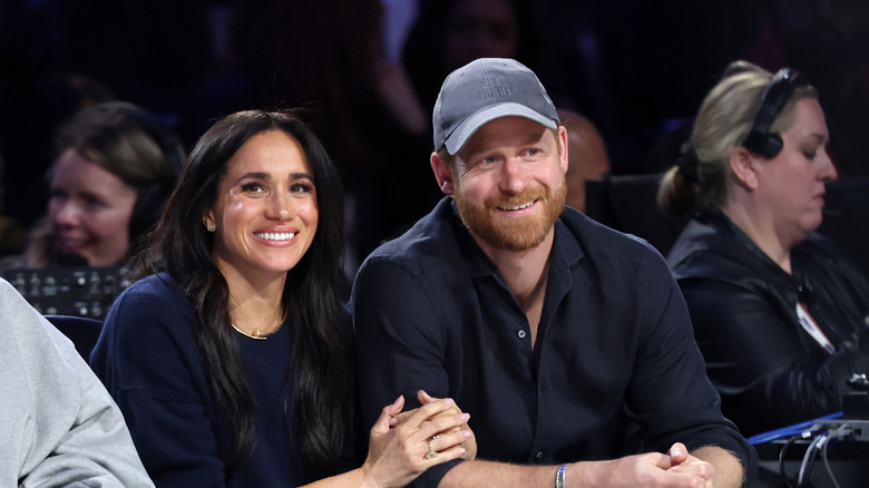 Meghan Markle and Prince Harry sitting together