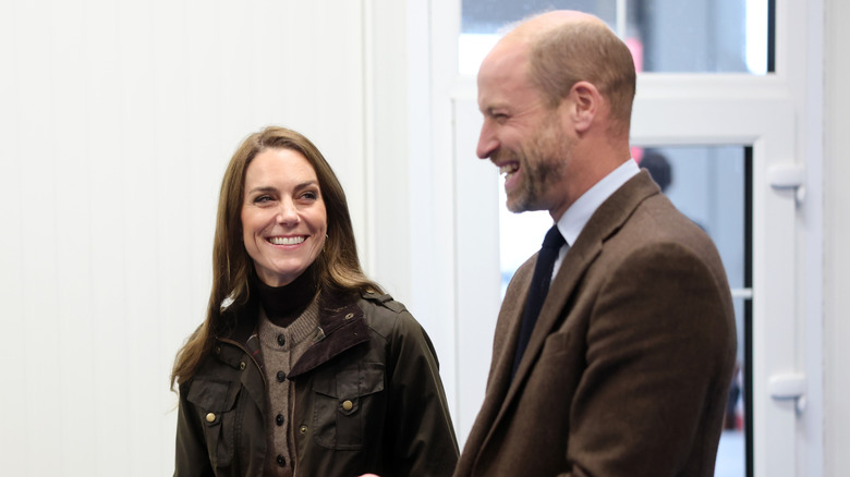 Kate Middleton smiling at Prince William