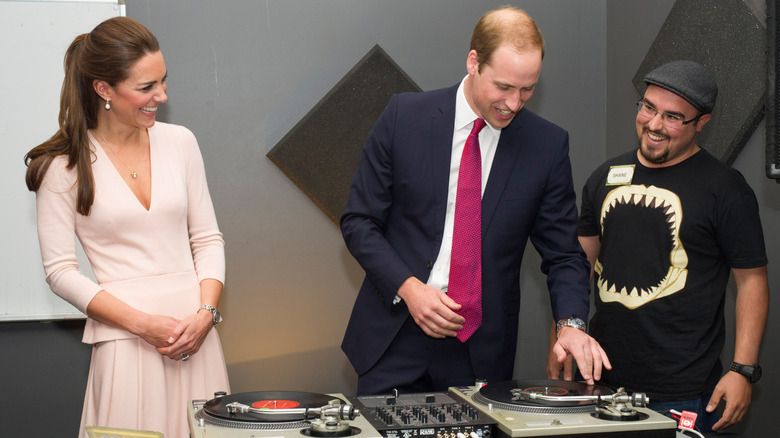 Kate Middleton laughing while Prince William DJs