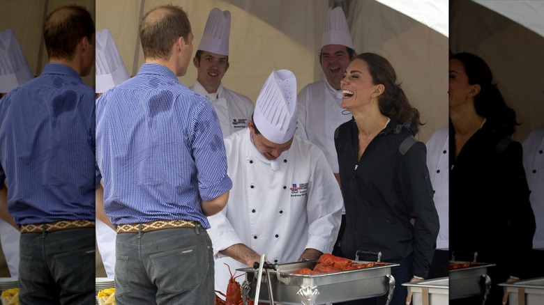 Kate Middleton and Prince William laughing alongside chefs