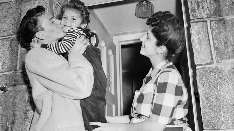 Frank Sinatra in 1944 photo with daughter, Nancy Jr., and wife, Nancy.