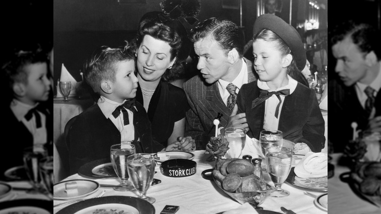 The Sinatra family (Frank Jr. Nancy, Frank, and Nancy Jr.) sit at the famous Stork Club