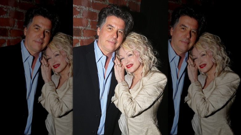 Cyndi Lauper and David Thornton posing