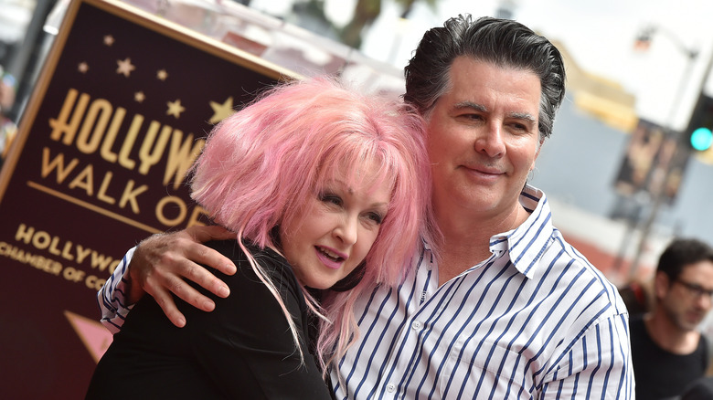 Cyndi Lauper and David Thornton smiling