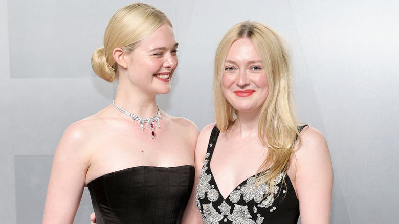 Elle Fanning and Dakota Fanning attend the 2026 Vanity Fair Oscar Party Hosted By Mark Guiducci at Los Angeles County Museum of Art on March 15, 2026 in Los Angeles, California.