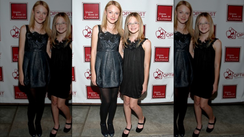 Actress Dakota Fanning and actress Elle Fanning arrive at The Optimist Youth Homes & Family Services' 2008 Mentor Awards Dinner and Fashion Show held at the Globe Theater on Octorber 22, 2008 in Universal City, California.