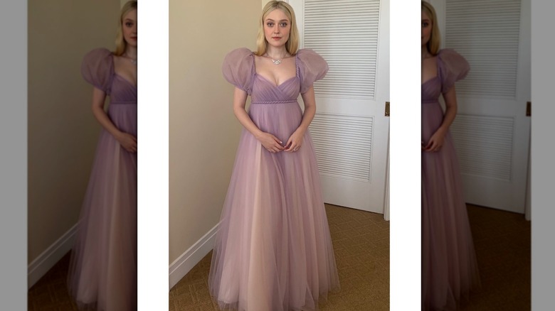 Dakota Fanning inside wearing a pale lavender gown with giant puffy short sleeves and sweetheart necline