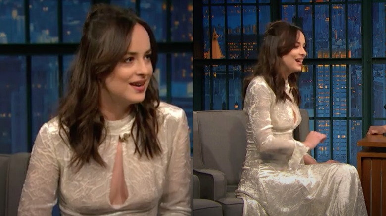 Dakota Johnson sitting on the sofa at Late Night With Seth Meyers in 2017