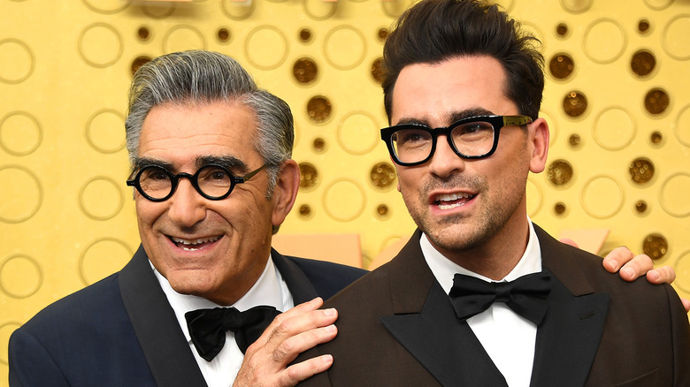 Eugene and Dan Levy attending an event