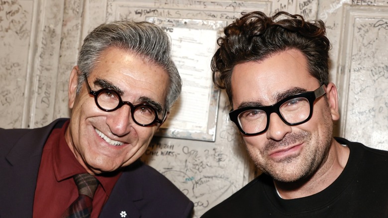 Eugene and Dan Levy smiling