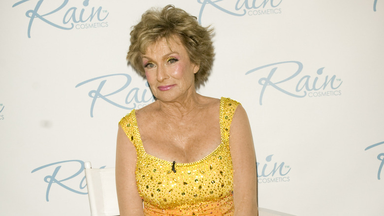 Cloris Leachman at a Dancing with the Stars gifting suite, posing in front of a white background