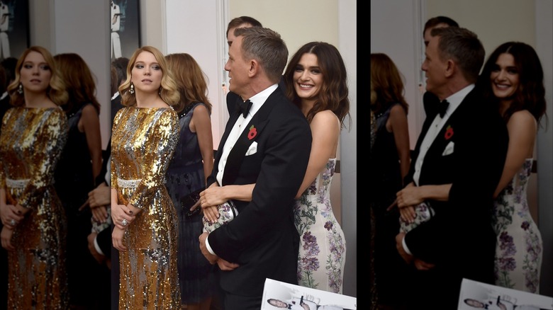 Rachel Weisz hugs Daniel Craig from behind