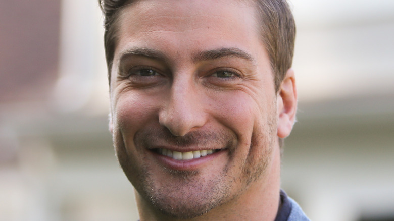 Daniel Lissing smiling