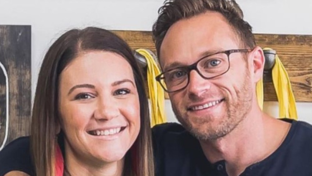 Adam and Danielle Busby smiling