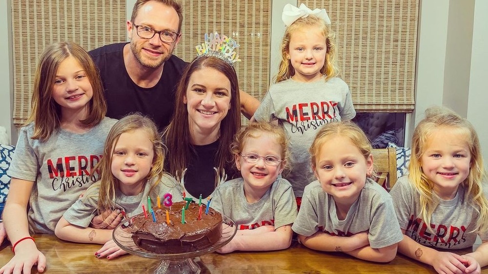 Busby family with birthday cake