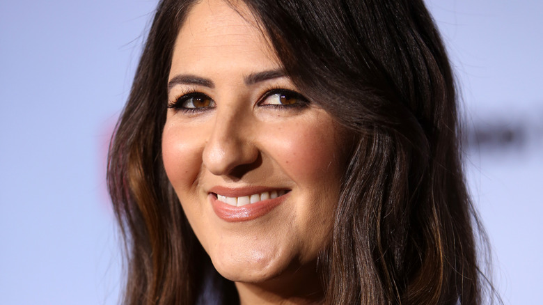 D'Arcy Carden smiling