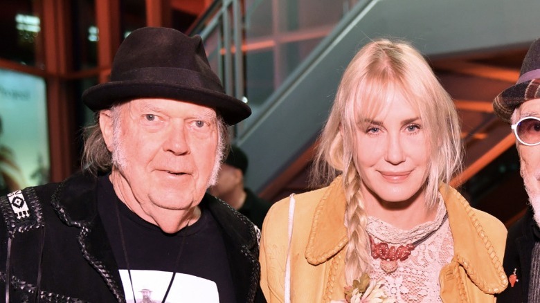 Neil Young and Daryl Hannah smiling