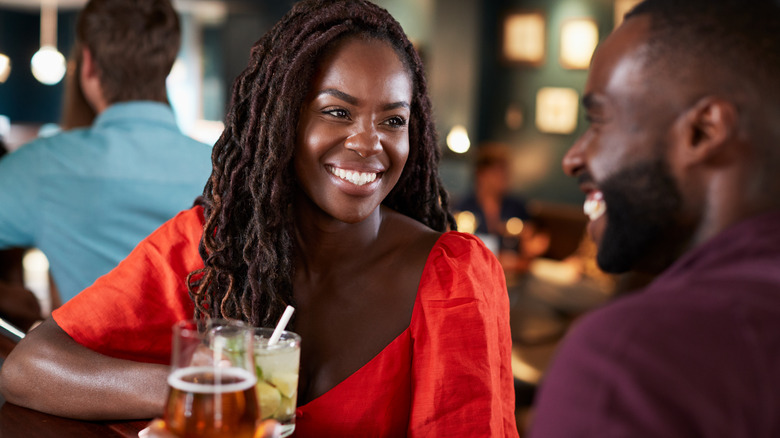 Couple on first date at bar