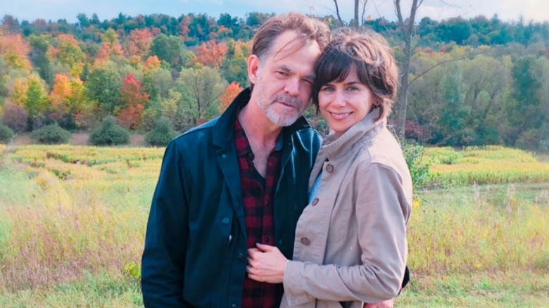 Stuart Hughes and Michelle Monteith posing outdoors
