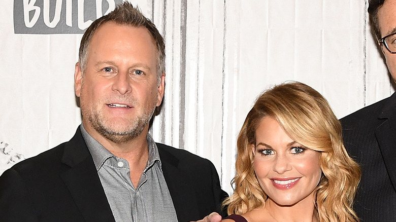 Dave Coulier and Candace Cameron Bure posing