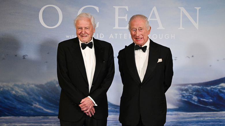 David Attenborough posing with King Charles III