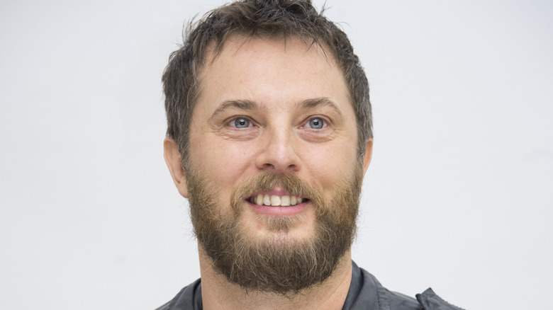 Duncan Jones smiling at Mute press conference in the Four Seasons Hotel