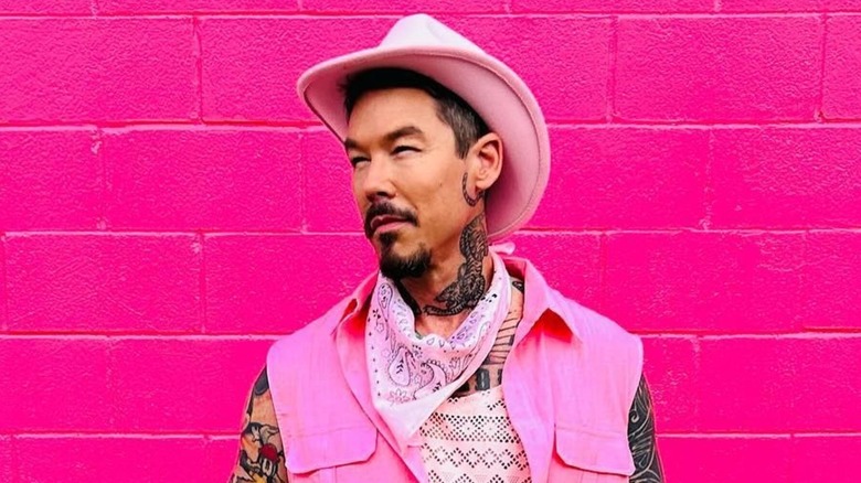 David Bromstad looking thoughtful and dressed as a cowboy