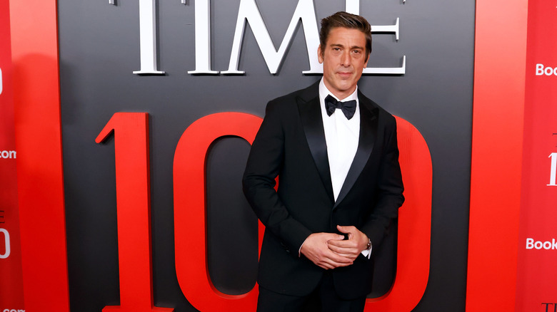 David Muir posing in a tuxedo at a TIME 100 event