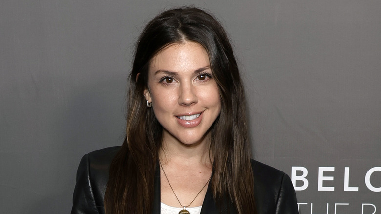 Kate Mansi smiling on the red carpet