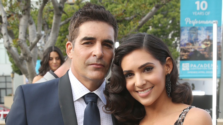 Galen Gering and Camila Banus posing