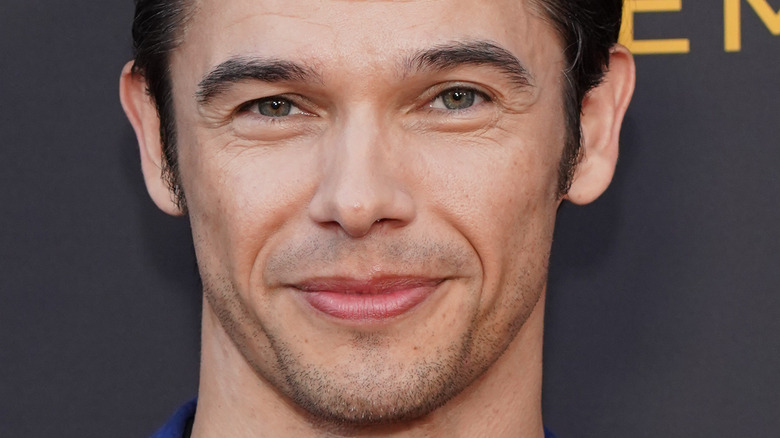 Paul Telfer poses on the red carpet