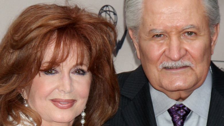 Suzanne Rogers and John Aniston at an event. 