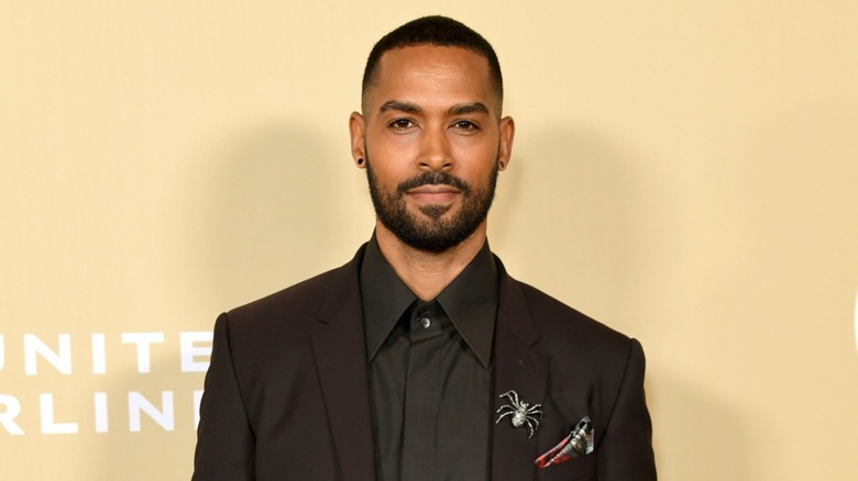 Lamon Archey smizing on the red carpet