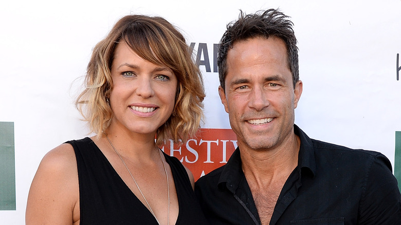 Arianne Zucker and Shawn Christian smiling