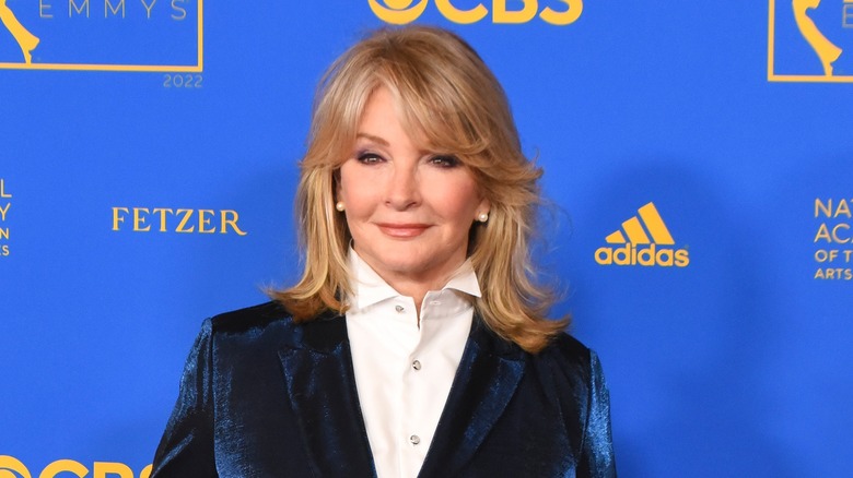 Deidre Hall smiling navy jacket
