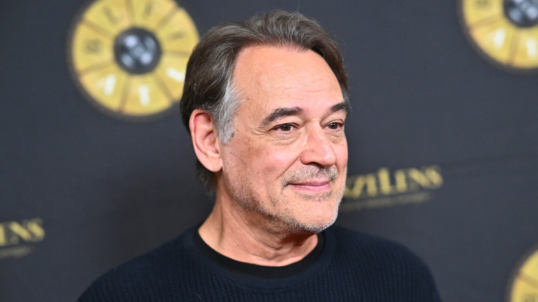 Jon Lindstrom smiling and posing