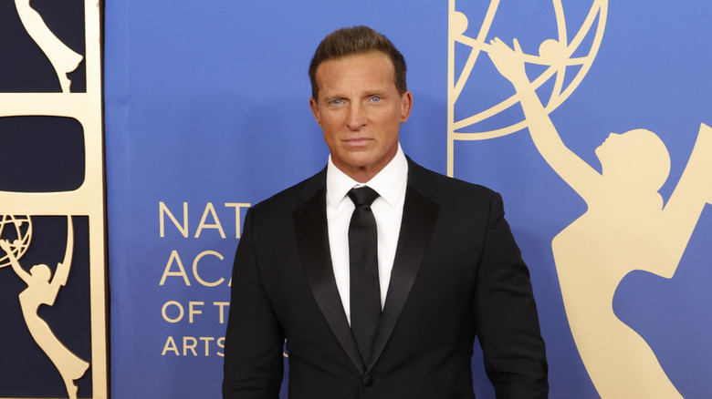 Steve Burton posing at industry event
