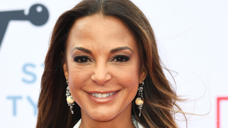 Eva LaRue smiling