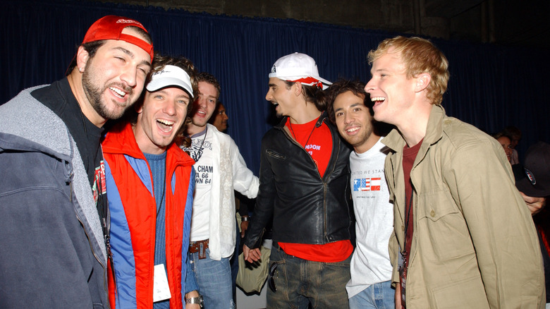 Members of Backstreet Boys and NSYNC backstage at a concert