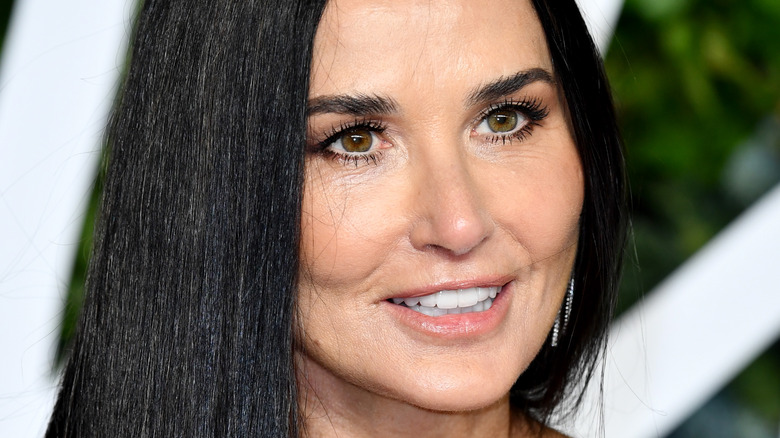 Demi Moore poses on red carpet