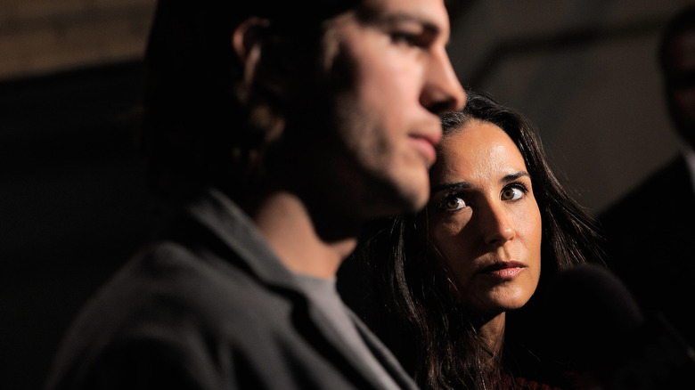 Demi Moore looking at Ashton Kutcher at an event in 2011