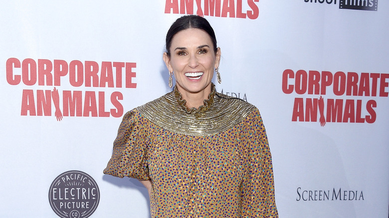 Demi Moore smiling at the premiere of Corporate Animals