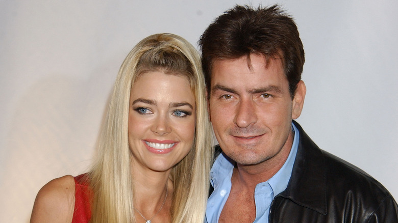 Charlie Sheen and Denise Richards posing