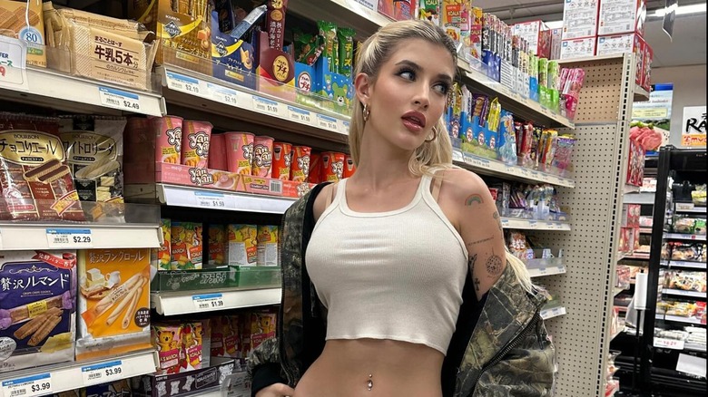 Sami Sheen posing in grocery store