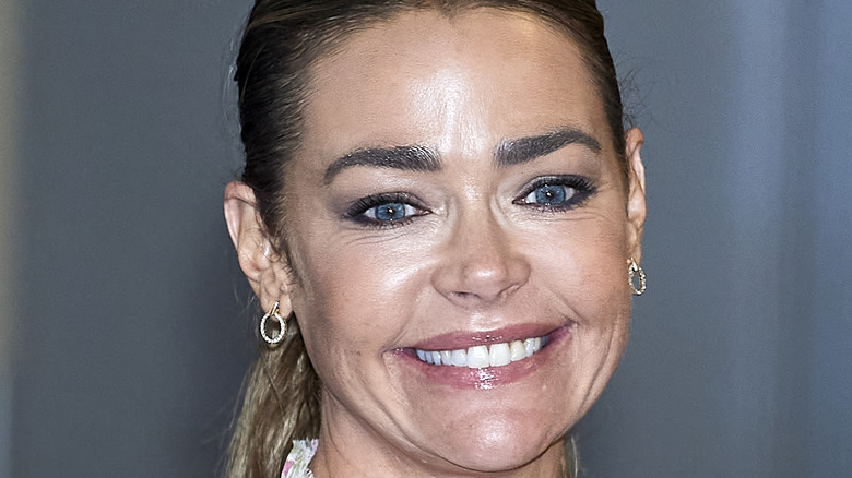 Denise Richards smiling big 