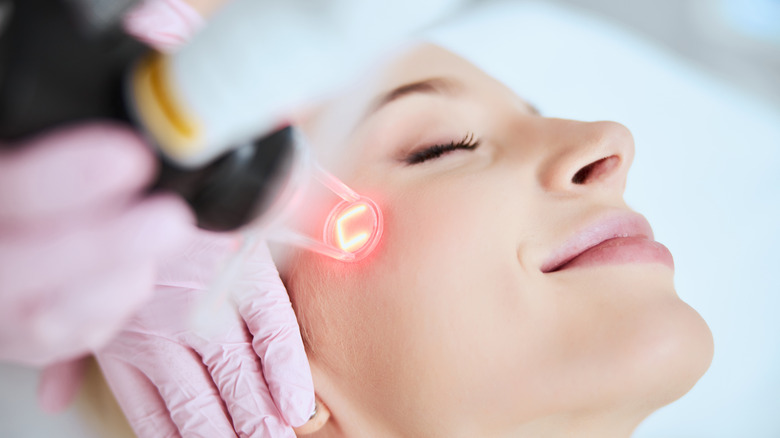 Woman getting laser treatment 