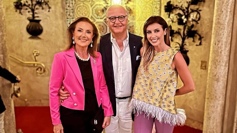 Alina Habba smiling with her parents