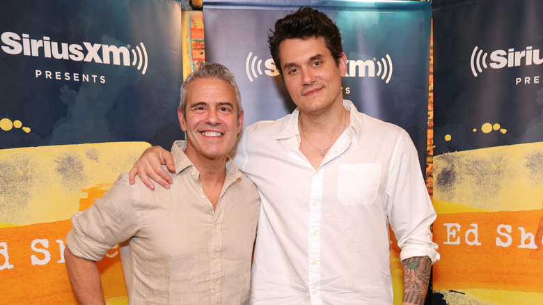 Andy Cohen and John Mayer posing