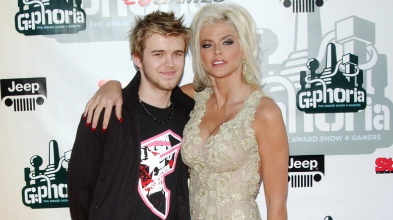 Anna Nicole Smith and her son, Daniel Wayne Smith, posing on step-and-repeat